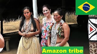 Amazon tribe in the rainforest [upl. by Namyac]